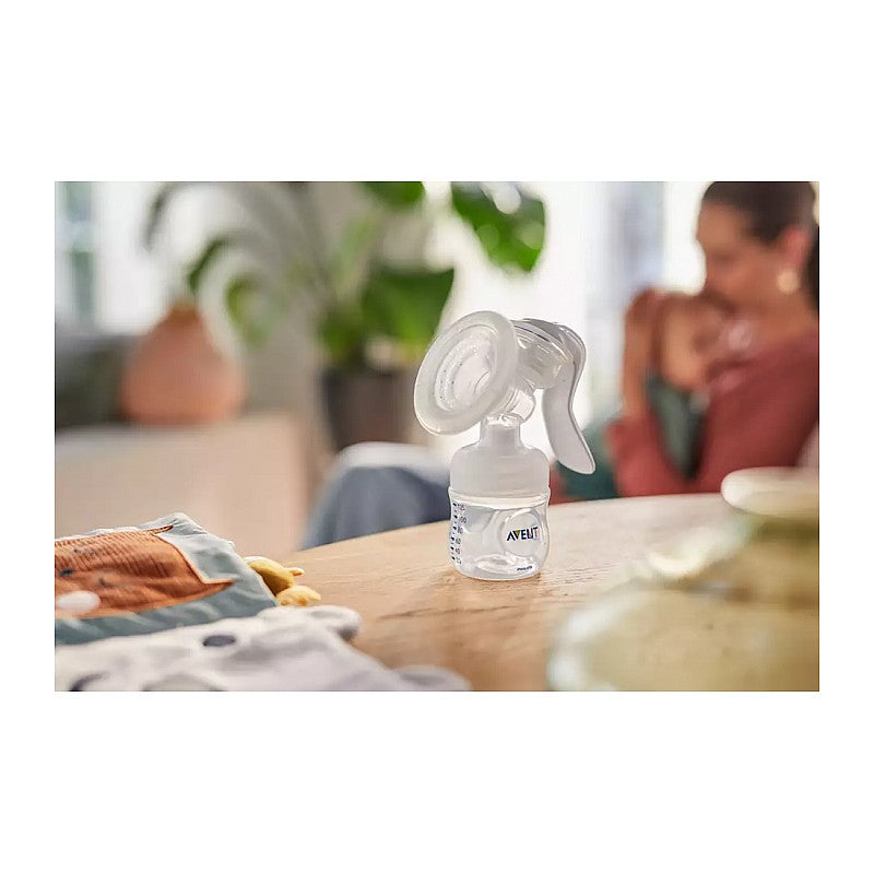 Philips Avent LOTUS manuālā krūts piena pumpis ar pudelīti SCF430/10